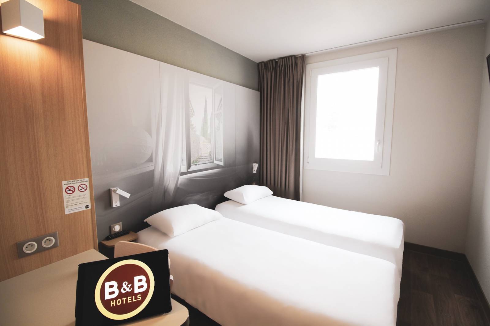 La chambre lits jumeaux de l'hôtel B&B Montélimar Sud à Montélimar