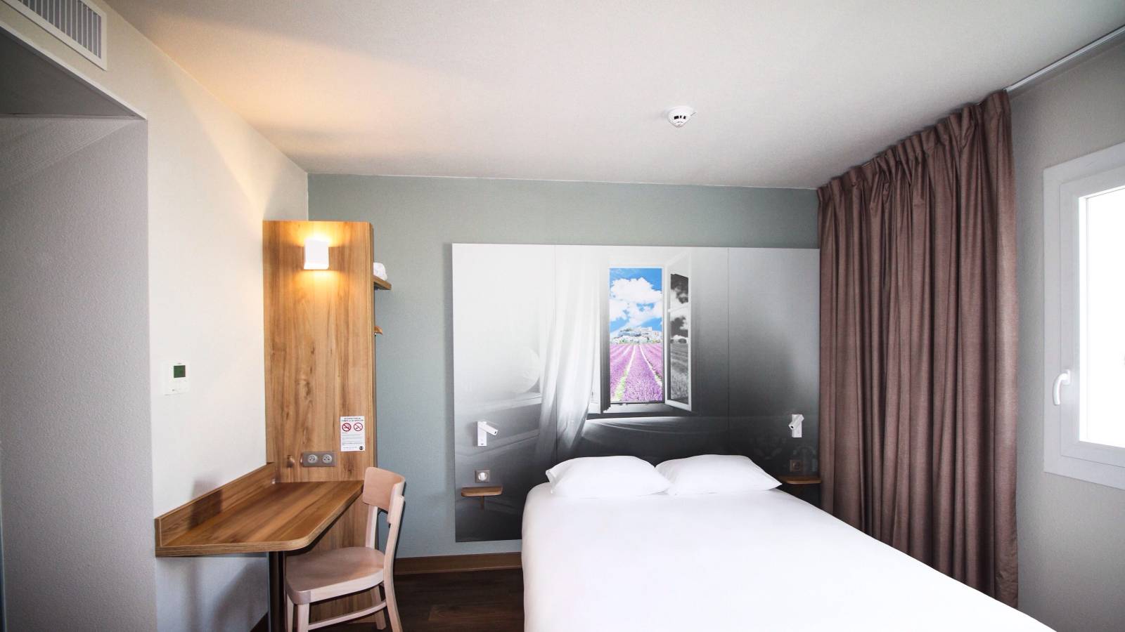 Chambre moderne et confort pour les professionnels en déplacement dans la Drôme.